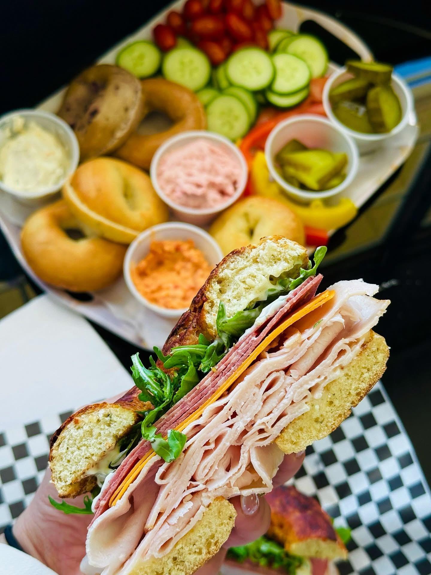 Classic sandwich with bagel platter Classic sandwich with bagel platter in the background