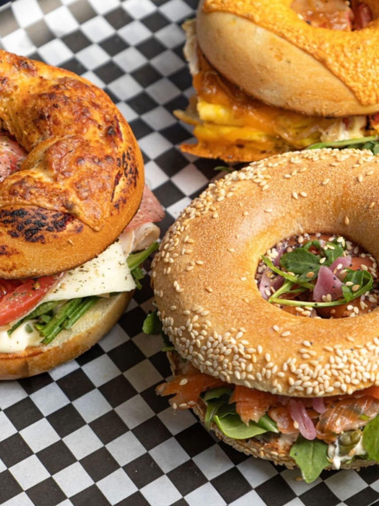 three bagel sandwiches